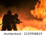 U.S. Marines with Expeditionary Firefighting and Rescue, Headquarters and Headquarters Squadron, Marine Corps Air Station(MCAS) Futenma, fight a controlled burn on MCAS Futenma, Okinawa, Japan, Feb. 2