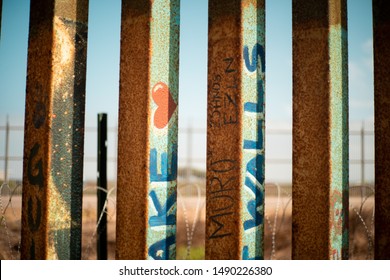 US And Mexico Border At The Beach