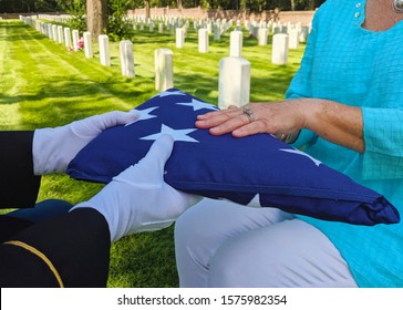 US Military Flag Presentation At National Cemetery