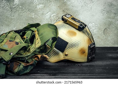 US Military Helmet On Wooden Background Close Up