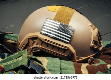 US Military Helmet On Wooden Background Close Up