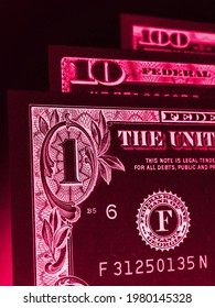 US Money Banknotes Of 1, 10 And 100 Dollars. Dark Vertical Dramatic Illustration About The American Economy, Public Finance And Taxation. A Black And Red Spectacular Print. Macro