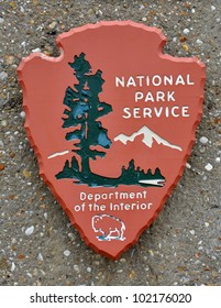 US National Park Service Sign On The Rock Background