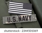 U.S. Navy Branch Tape with national US flag patch on green ammo can background