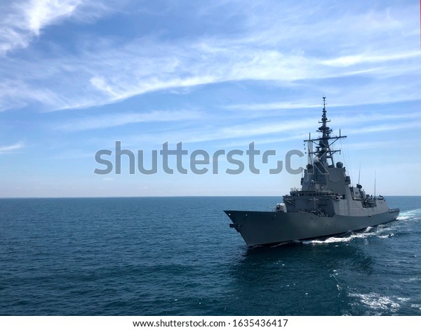 US navy NATO ship sailing at sea during nato\
war exercises