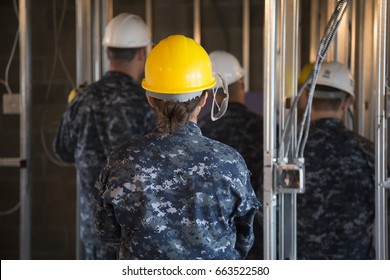 US Navy Sailors Based In Norfolk, VA Help Habitat For Humanity NYC On A Home Building Construction Project In The Brownsville Section Of Brooklyn During Fleet Week New York, NEW YORK MAY 25 2017.