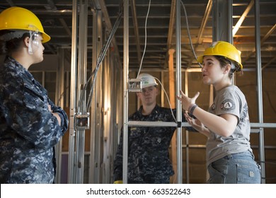 US Navy Sailors Based In Norfolk, VA Help Habitat For Humanity NYC On A Home Building Construction Project In The Brownsville Section Of Brooklyn During Fleet Week New York, NEW YORK MAY 25 2017.