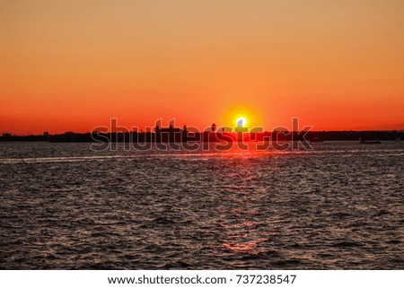 Similar – Image, Stock Photo Staten Island Ferry in Front of New York City’s Skyline