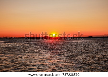 Similar – Image, Stock Photo Staten Island Ferry in Front of New York City’s Skyline