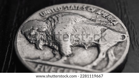 US nickel. Coin 5 five cents close up. Black and white stories with American bison. Buffalo nickel. News about USA economy and money. Public debt and treasury. Five-cent coin. Macro