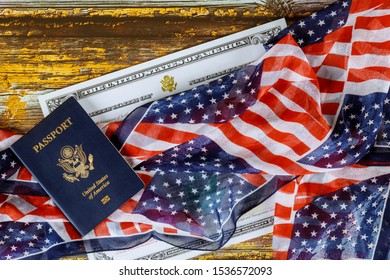 US Passport And Flag Over A Citizenship Naturalization Certificate