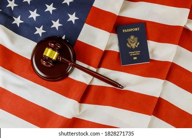 US Passports With Wooden Judge Gavel On American Flag On Legal World Immigration