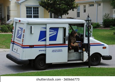 US POST VEHICLE IN SUMMERFIELD FLORIDA USA - CIRCA 2014 -United States Postal Service Collection And Delivery Van On A Residential Complex In Summerfield  Florida USA