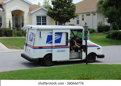 US POST VEHICLE IN SUMMERFIELD FLORIDA USA - CIRCA 2014 -United States Postal Service Collection And Delivery Van On A Residential Complex In Summerfield  Florida USA