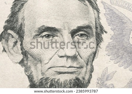 US President Abraham Abe Lincoln on USA five dollar bill extreme macro, 5 usd, United States of America money closeup