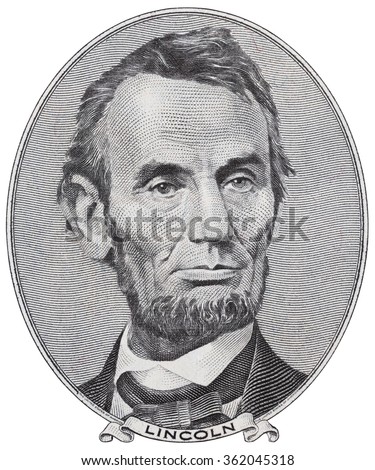 US President Abraham Lincoln on five dollar bill macro isolated, 5 usd, united states money closeup