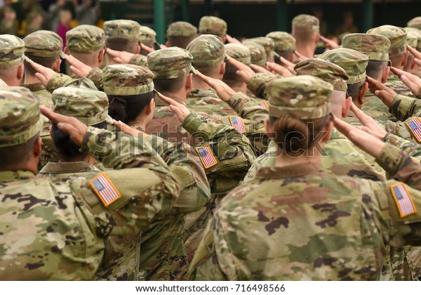 Us Soldiers Giving Salute Stock Photo (Edit Now) 716498566