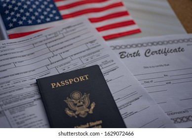 U.S. Standard Certificate Of Live Birth Application Form Next To American Flag, Passport Of USA And Birth Certificate Template. USA Birthright Citizenship Concept. 