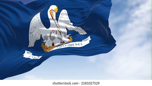 The US State Flag Of Louisiana Waving In The Wind. Louisiana Is A State In The Deep South And South Central Regions Of The United States. Democracy And Independence.