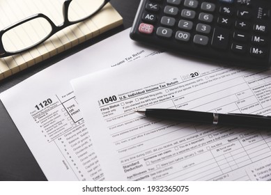 US Tax Form On Desk. Tax Income 2020 Concept