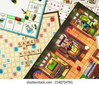 USA -2022: Family Game Night. Monopoly, Clue, Scrabble, And Sequence Board Games. Classic Table Games. Monopoly Multi-player Economics Game. Clue Murder Mystery Game. Scrabble Is A Word Game.