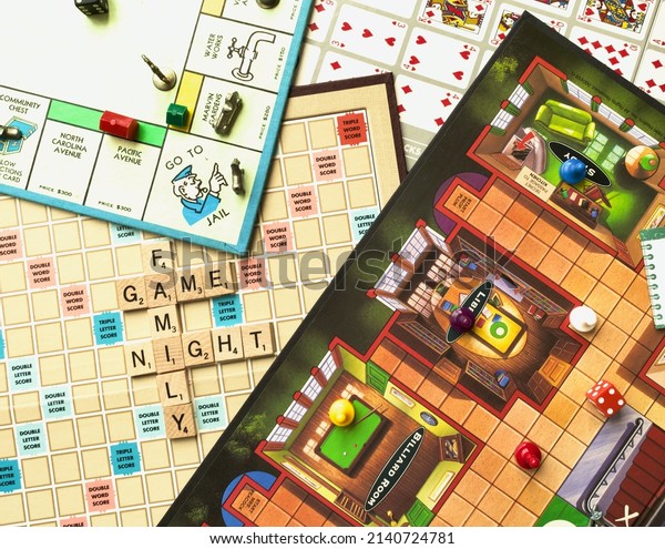 USA -2022: Family Game Night. Monopoly, Clue,\
Scrabble, and Sequence board games. Classic table games. Monopoly\
multi-player economics game. Clue murder mystery game. Scrabble is\
a word game.