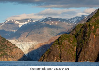 USA, Alaska, Tracy Arm-Fords Terror Wilderness, Setting Summer Sun Lights Mountains Surrounding South Sawyer Glacier In Tracy Arm On Summer Evening