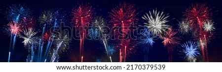 USA america united states new year or Independence Day celebration holiday background banner panorama greeting card - Blue red white firework on dark night sky