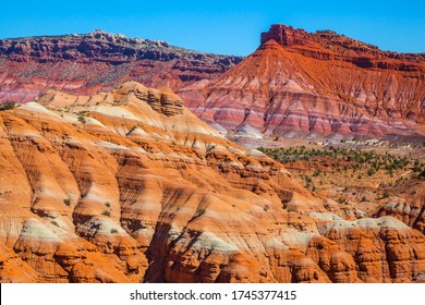 USA. Arizona, Utah. Huge slopes of red sandstone, striped from various inclusions of light rocks. Paria Canyon-Vermilion Cliffs Wilderness Area. The concept of active, extreme and photo tourism
