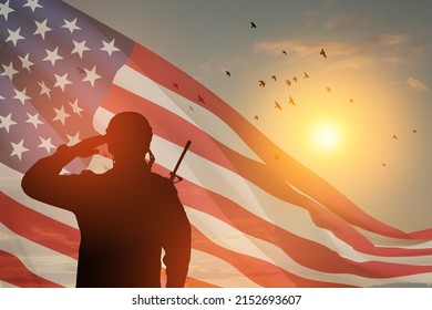 USA army soldier saluting on a background of sunset or sunrise and USA flag. Greeting card for Veterans Day, Memorial Day, Independence Day. America celebration. Closeup. 3D-rendering. - Powered by Shutterstock