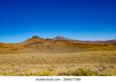 USA, California. Black Rock Desert, Sagebrush And Calico Mountains From SR 34