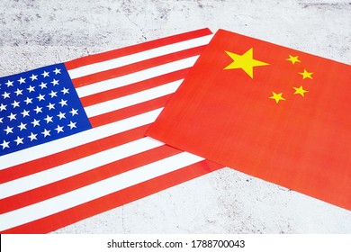 USA & China - Disagreement, US Of America And Chinese Flags. Relationship Conflict Between USA And China. Trade Deal Concept. Coronacrisis