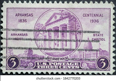 USA - Circa 1936 a postage stamp printed in the US showing  the old stade house. text: 1836 Arkansas Centennial 1936