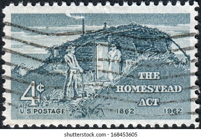 USA - CIRCA 1962: Postage Stamp Printed In The USA, Homestead Act Centenary, Shows Sod Hut And Settlers, Circa 1962