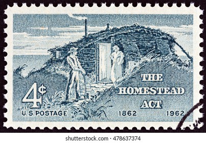 USA - CIRCA 1962: A Stamp Printed In USA Issued For The Centenary Of Homestead Act Shows Settlers, Circa 1962.