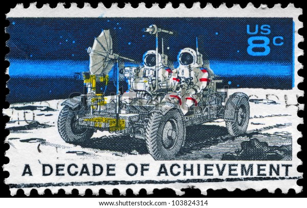 USA - CIRCA 1971: A Stamp\
printed in USA shows the Lunar Rover, Apollo 15 moon exploration\
mission July 26-August 7, Space Achievement Decade Issue, circa\
1971