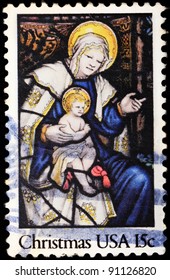 USA -CIRCA 1980: A Stamp Printed In USA Shows The Picture Of Madonna And Child In Her Lap, Circa 1980