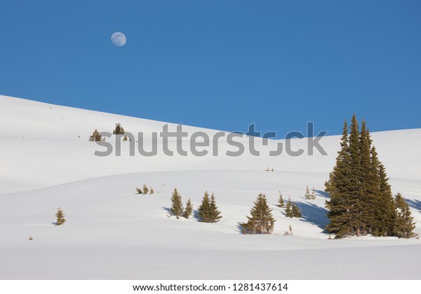 USA,\
Colorado. Moon rise above the Continental\
Divide.
