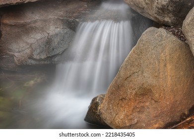 USA, Colorado, Steamboat Springs. Hot Spring Water In Waterfall.