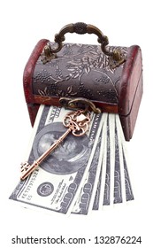 USA Dollars In A Wood Treasure Chest With Old Skeleton Key Isolated On White/Money Under Lock And Key