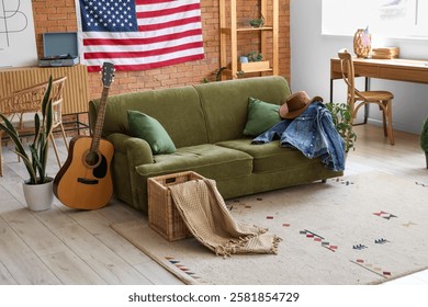 USA flag and comfortable sofa in interior of living room