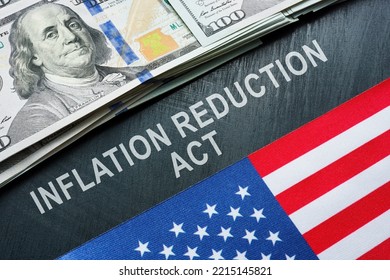 USA flag, dollars and inscription inflation reduction act. - Shutterstock ID 2215145821