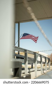 USA Flag Flying In The Wind At California Airbase