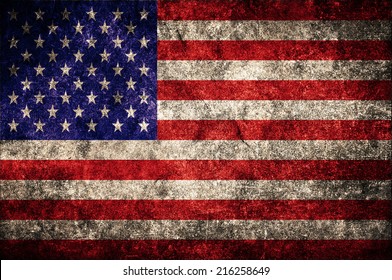 USA flag on the grunge concrete wall. United States of America