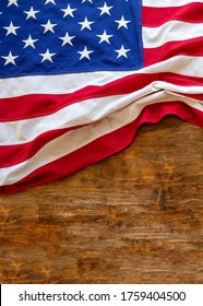 USA  flag on wooden table background. American flag top view, copy space. Memorial day and 4th of July, Independence day mockup, template