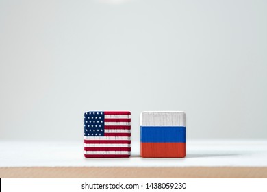 USA Flag And Russia Flag Print Screen On Wooden Cubic With White Background.United State Of America  Is Leader Of Democracy And Russia Is Communist After World War Two And Cold War.-Image.