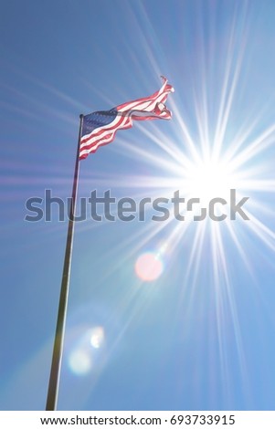 U.S.A Flag with sun light from The Statue of Liberty at Manhattan ,New York