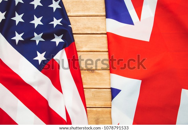 USA flag and UK Flag background.Relations,
diplomacy between States.