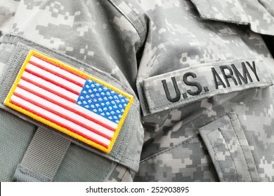 USA Flag And U.S. Army Patch On Solder's Uniform