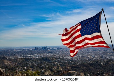 USA Flag Waves Over City Of Los Angeles California